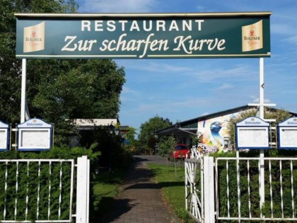 照片: Zur scharfen Kurve